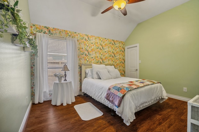 2850 Woodland Glen Ln, Conroe, TX 77385 - bedroom with vaulted ceiling, baseboards, wallpapered walls, a ceiling fan, and wood finished floors