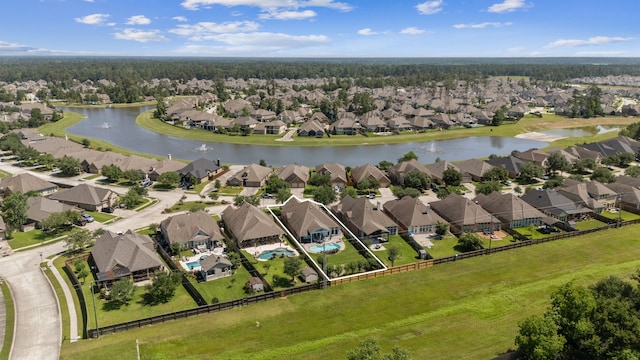 2850 Woodland Glen Ln, Conroe, TX 77385 - aerial view of residential area with a nearby body of water