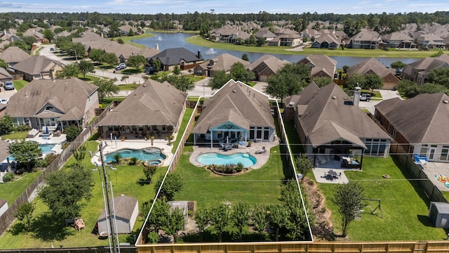 2850 Woodland Glen Ln, Conroe, TX 77385 - aerial view of residential area featuring property boundaries highlighted, a pool area, and a large body of water