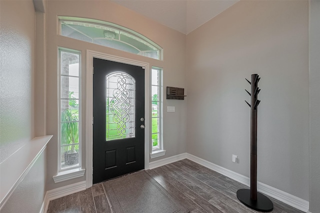 3331 Bridgette Ln, Baytown, TX 77523 - entrance foyer featuring dark wood-type flooring and baseboards