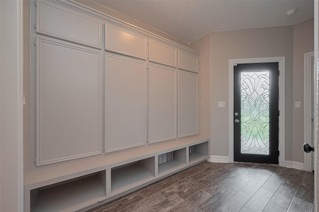 3331 Bridgette Ln, Baytown, TX 77523 - mudroom with dark wood finished floors and baseboards