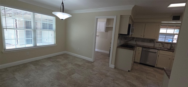 15311 Empanada Dr, Houston, TX 77083 - kitchen featuring stainless steel appliances, crown molding, dark countertops, decorative light fixtures, and baseboards