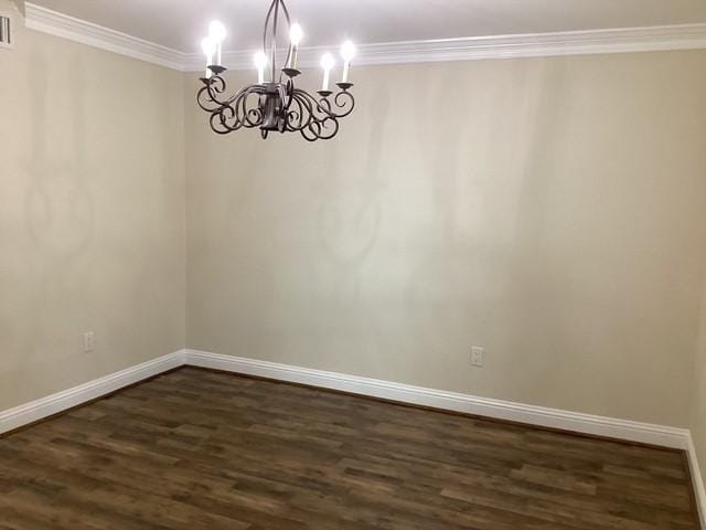 15311 Empanada Dr, Houston, TX 77083 - empty room featuring a chandelier, dark wood finished floors, baseboards, and ornamental molding