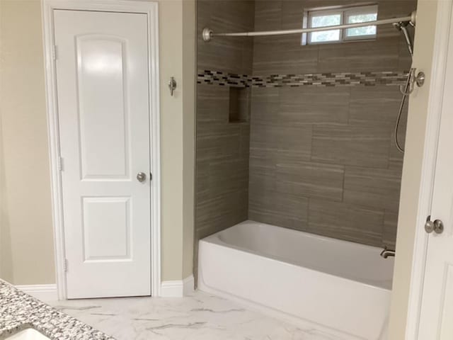 15311 Empanada Dr, Houston, TX 77083 - full bathroom with marble look tiles, shower / washtub combination, baseboards, and vanity