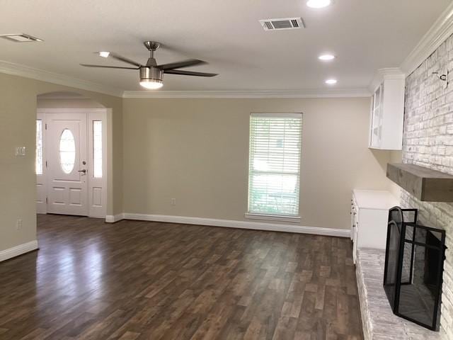 15311 Empanada Dr, Houston, TX 77083 - unfurnished living room with a ceiling fan, dark wood-style flooring, ornamental molding, baseboards, and recessed lighting