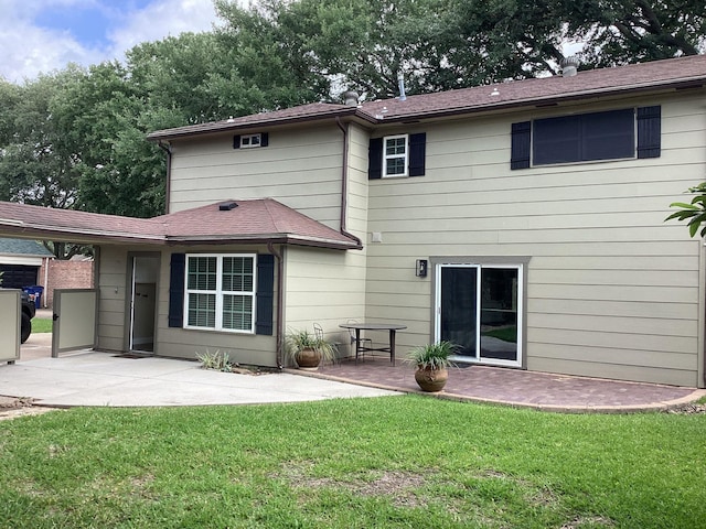 15311 Empanada Dr, Houston, TX 77083 - back of house featuring a patio and a lawn