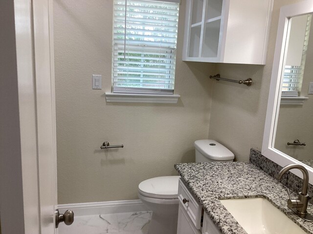 15311 Empanada Dr, Houston, TX 77083 - half bathroom with vanity and marble finish flooring