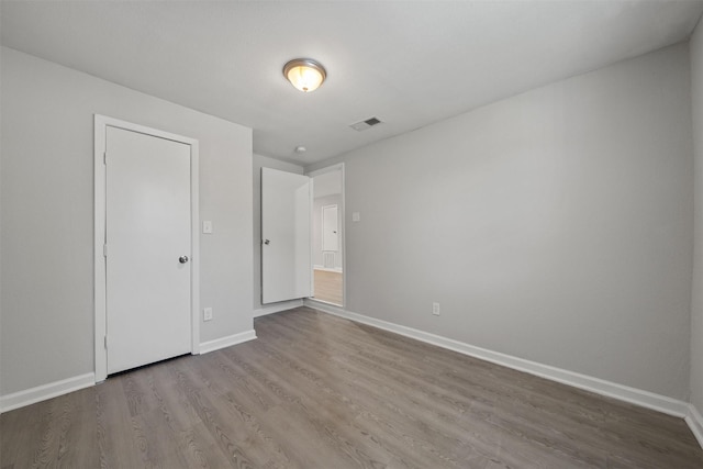 5313 Doolittle Blvd, Houston, TX 77033 - unfurnished bedroom with wood finished floors and baseboards