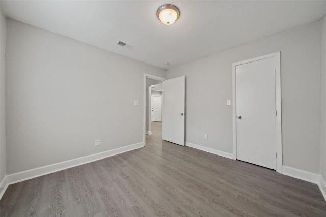 5313 Doolittle Blvd, Houston, TX 77033 - unfurnished bedroom featuring wood finished floors and baseboards