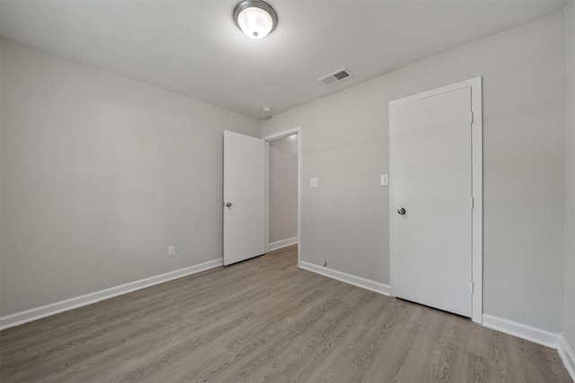 5313 Doolittle Blvd, Houston, TX 77033 - unfurnished bedroom with wood finished floors and baseboards