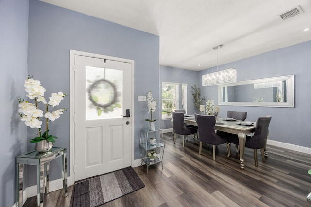 entryway featuring baseboards, dark wood-style flooring, and recessed lighting