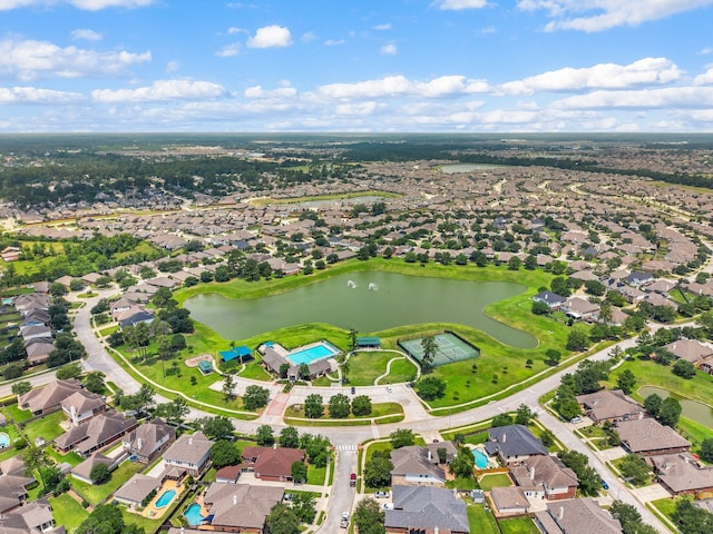 view of property location featuring nearby suburban area and a nearby body of water