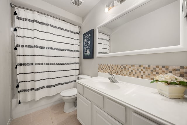 bathroom with toilet, vanity, shower / bathtub combination with curtain, tile patterned floors, and backsplash