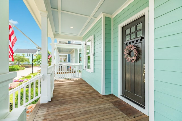 9 Caravelle Ct, Galveston, TX 77554 - doorway to property featuring a porch