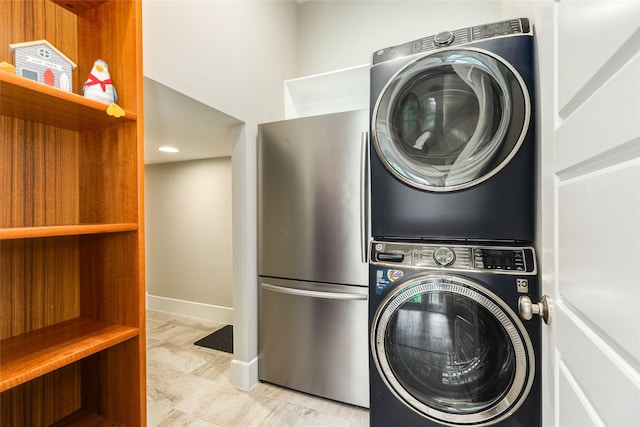 9 Caravelle Ct, Galveston, TX 77554 - washroom with estacked washer and dryer, baseboards, and recessed lighting