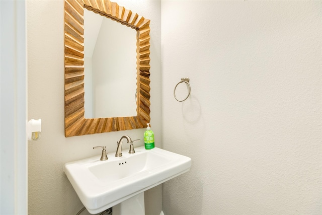 9 Caravelle Ct, Galveston, TX 77554 - bathroom featuring a sink