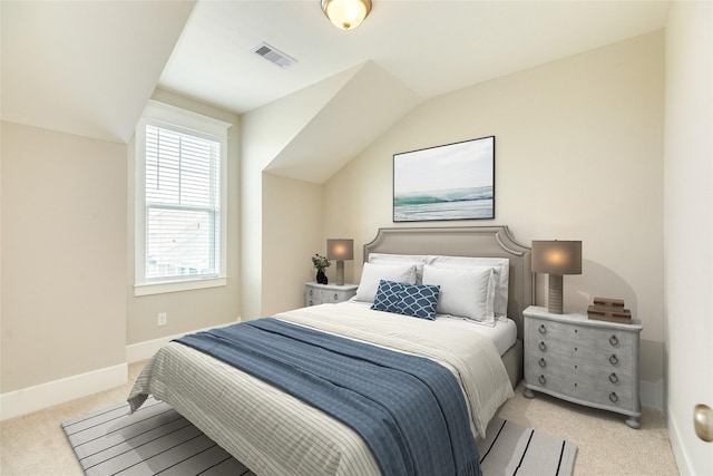 9 Caravelle Ct, Galveston, TX 77554 - bedroom featuring carpet, baseboards, and lofted ceiling
