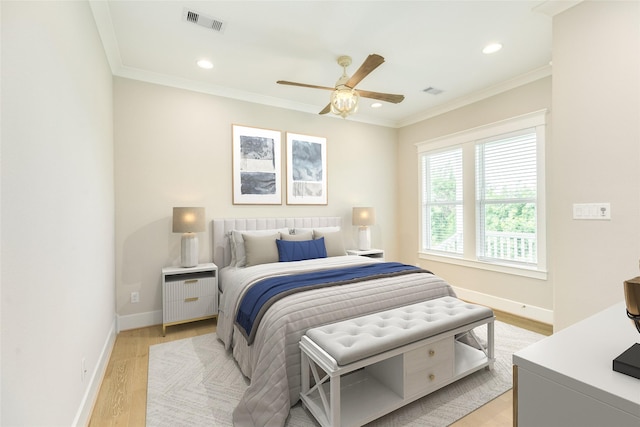 9 Caravelle Ct, Galveston, TX 77554 - bedroom featuring light wood-type flooring, baseboards, recessed lighting, ornamental molding, and ceiling fan