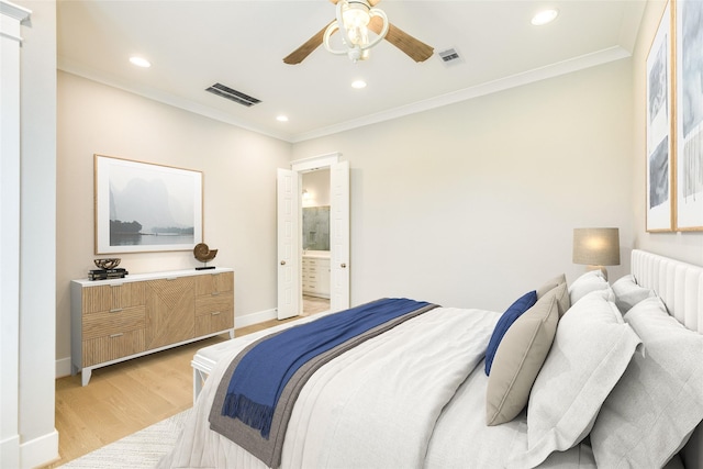 9 Caravelle Ct, Galveston, TX 77554 - bedroom featuring crown molding, light wood-style floors, recessed lighting, baseboards, and ensuite bath