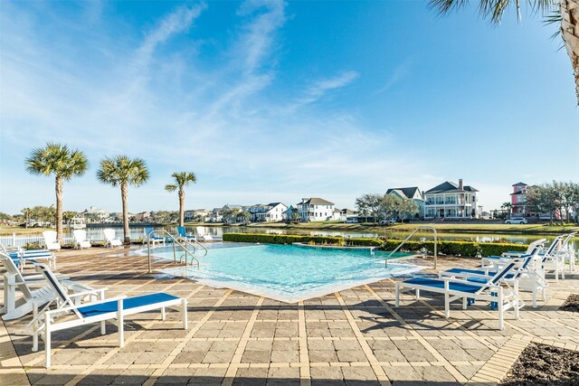 9 Caravelle Ct, Galveston, TX 77554 - community pool with a patio area