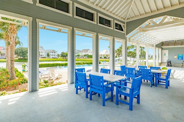 9 Caravelle Ct, Galveston, TX 77554 - sunroom / solarium featuring a residential view