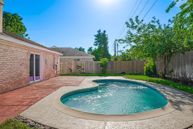 22010 Elsinore Dr, Katy, TX 77450 - view of swimming pool featuring a patio area and a fenced backyard