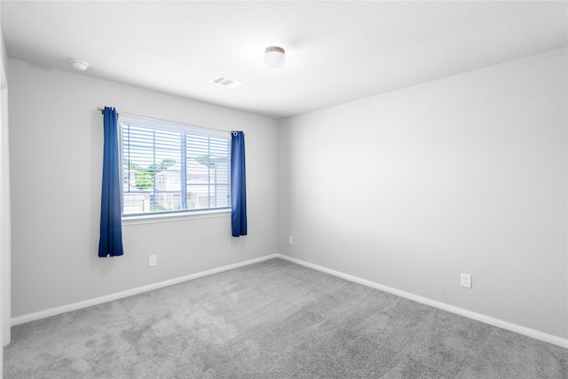 24511 Lorenzo Glaze Trl, Katy, TX 77493 - carpeted empty room featuring baseboards and a smoke detector