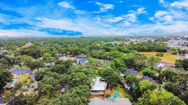 aerial view of residential area with a pool area