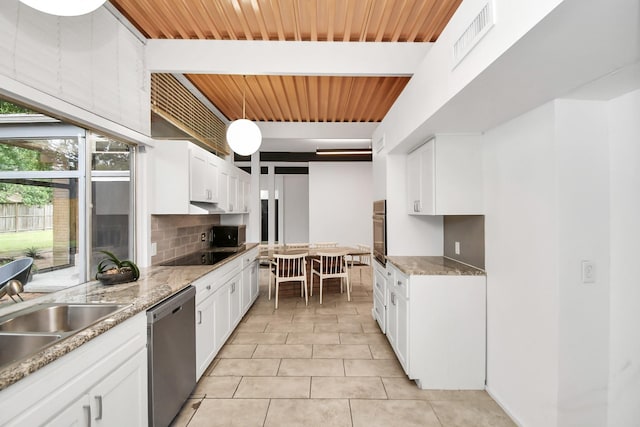 kitchen with appliances with stainless steel finishes, wooden ceiling, light tile patterned floors, white cabinets, and backsplash