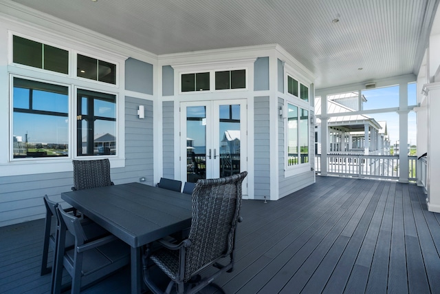 3835 Seabreeze Ln, Galveston, TX 77554 - deck featuring french doors and outdoor dining area