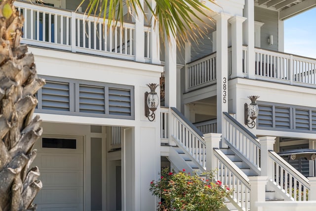 3835 Seabreeze Ln, Galveston, TX 77554 - view of home's exterior featuring stairs and a balcony