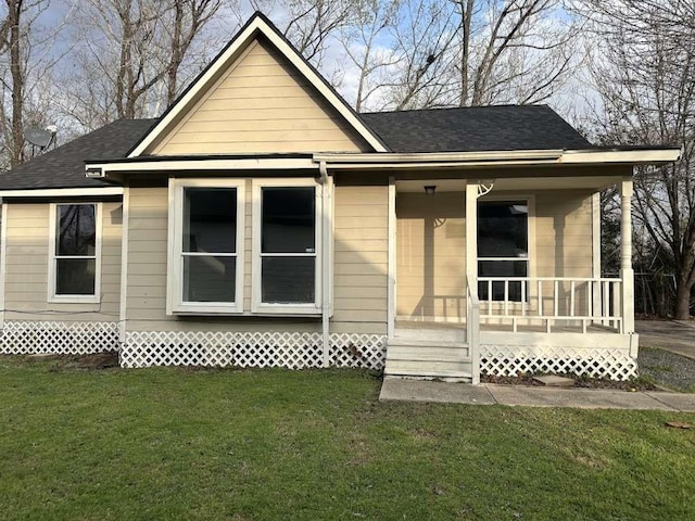 5919 Woodview Dr, Houston, TX 77396 - bungalow with a porch, a front yard, and roof with shingles