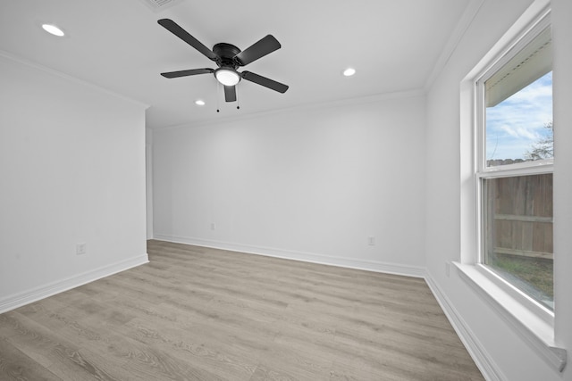 empty room with recessed lighting, crown molding, ceiling fan, light wood-style floors, and baseboards