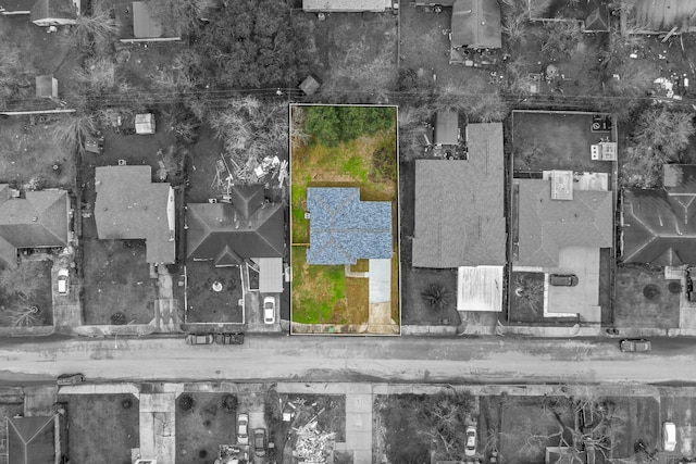 aerial view of property and surrounding area with property boundaries highlighted