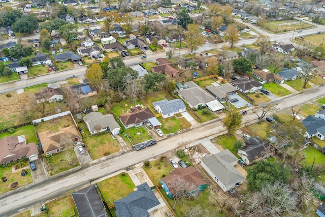 aerial view of property's location featuring nearby suburban area