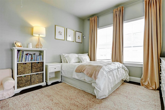 6003 Matthew Oaks Pl, Houston, TX 77007 - bedroom with multiple windows and wood finished floors