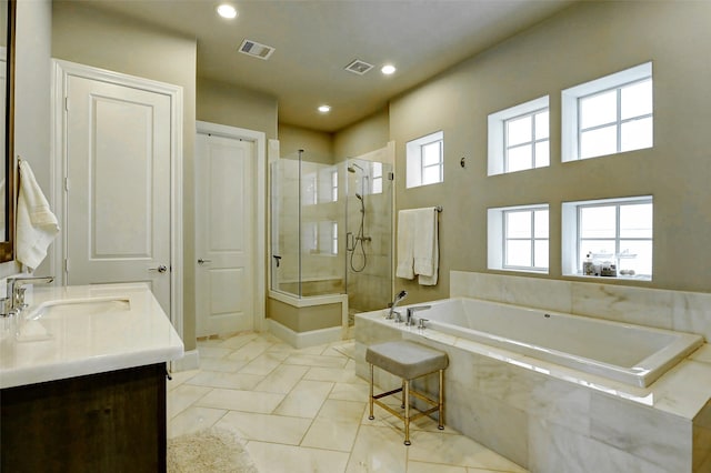 6003 Matthew Oaks Pl, Houston, TX 77007 - full bath featuring a shower stall, a garden tub, double vanity, and recessed lighting