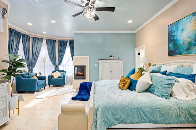 17511 Hawkin Ln, Tomball, TX 77377 - bedroom with recessed lighting, ornamental molding, light tile patterned floors, a ceiling fan, and a glass covered fireplace