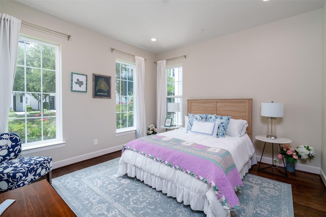 817 Blackshire Ln, Houston, TX 77055 - bedroom featuring baseboards, wood finished floors, and recessed lighting