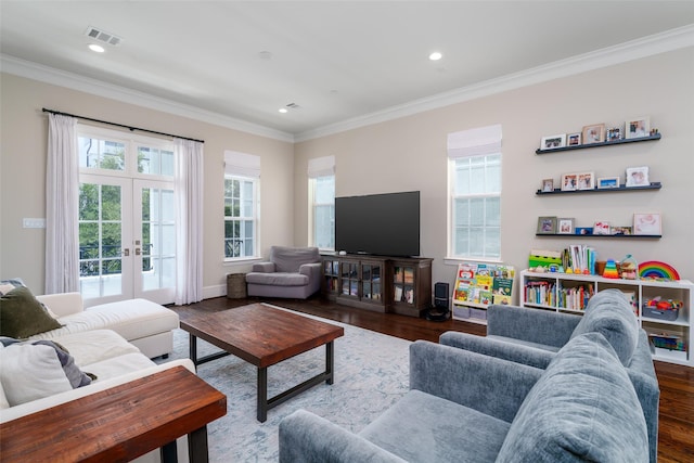 817 Blackshire Ln, Houston, TX 77055 - living area with dark wood-style floors, ornamental molding, french doors, recessed lighting, and baseboards