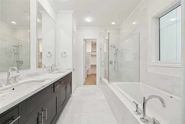 7506 Viano Ln, Houston, TX 77055 - bathroom featuring a shower stall, crown molding, a garden tub, double vanity, and recessed lighting