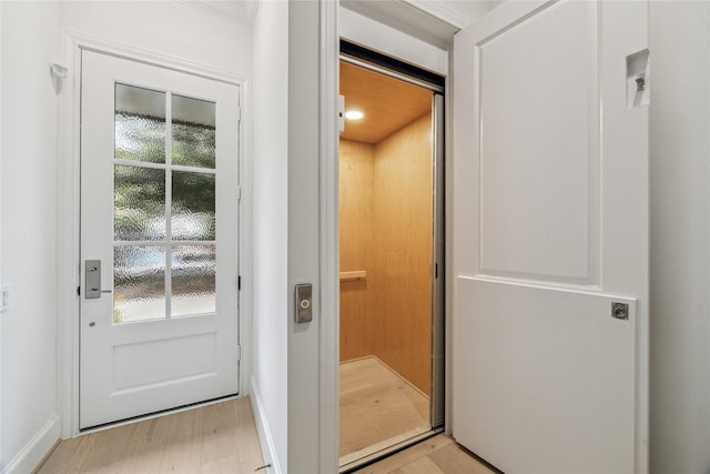 7506 Viano Ln, Houston, TX 77055 - entryway with baseboards and light wood-type flooring