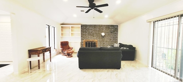 7515 Hopewell Ln, Houston, TX 77071 - living room featuring plenty of natural light, a brick fireplace, ceiling fan, vaulted ceiling, and baseboards