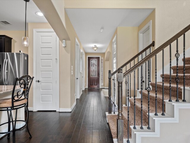 18118 Berry Garden Ln, Spring, TX 77379 - entryway featuring baseboards, dark wood-style flooring, and stairway