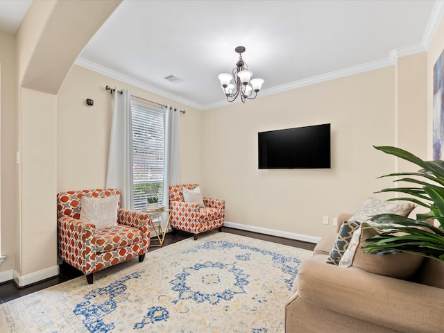 18118 Berry Garden Ln, Spring, TX 77379 - living room featuring a chandelier, ornamental molding, wood finished floors, and baseboards