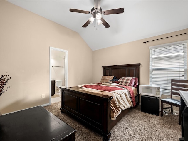 18118 Berry Garden Ln, Spring, TX 77379 - carpeted bedroom featuring lofted ceiling, a ceiling fan, and connected bathroom
