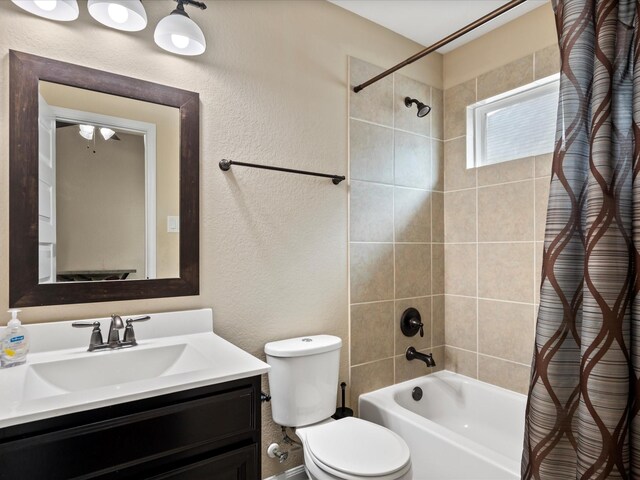 18118 Berry Garden Ln, Spring, TX 77379 - full bath with shower / bath combination with curtain, toilet, vanity, and a textured wall