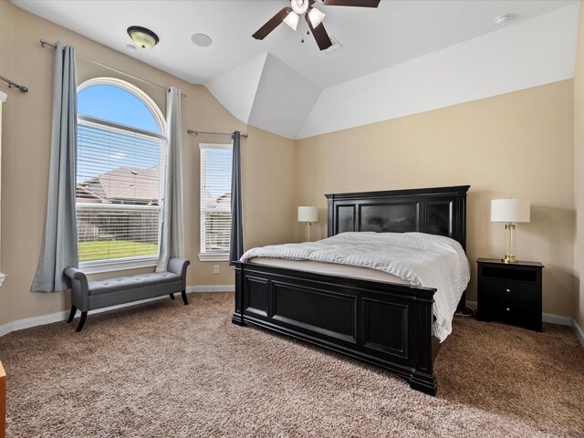 18118 Berry Garden Ln, Spring, TX 77379 - bedroom featuring light colored carpet, multiple windows, baseboards, and vaulted ceiling