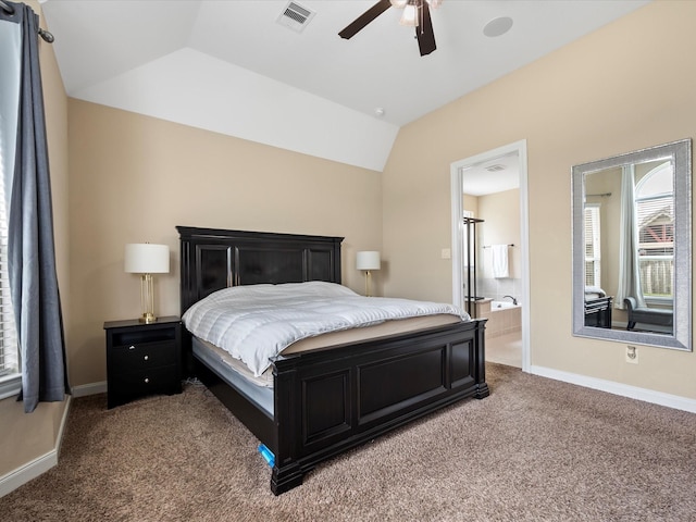 18118 Berry Garden Ln, Spring, TX 77379 - bedroom with carpet flooring, vaulted ceiling, baseboards, ensuite bath, and a ceiling fan