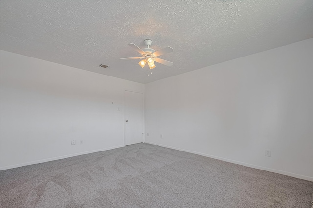 10306 Jillana Kaye Dr, Houston, TX 77086 - carpeted empty room featuring a ceiling fan, a textured ceiling, and baseboards